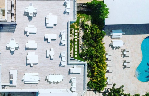West Bay Condo | 7 Mile Beach Condo with Pool View and Rooftop