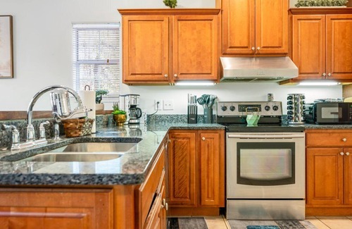 Colonial Oaks House | 75' TV - Summer Retreat - King Bed, Large Yard, No Stairs
