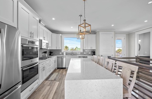 Butler Beach House | 8BR LUXURY OCEANFRONT, 8 KING SUITES, LARGE HEATED POOL, FOOSBALL!