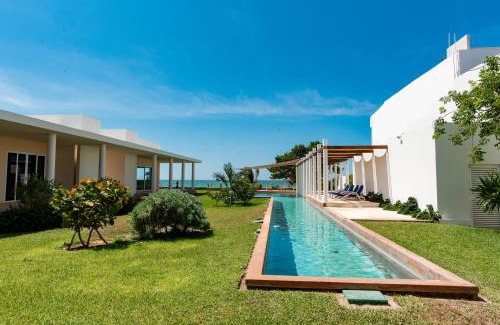 Chicxulub Puerto House | 97985 Stunning beachfront Suites Wi-Fi East of Progreso