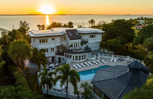 Fort Pierce Villa | 9K SF Waterfront Mansion, Poo, Boat Dock, Theater