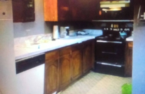 Wichita Falls Apartment | A 2 Bedroom 1 bath apartment with fireplace 101-A+Food Pantry