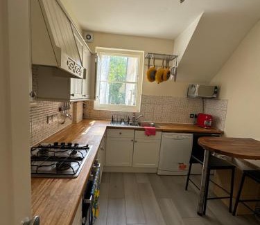 Vauxhall House | A beautiful room with a private garden