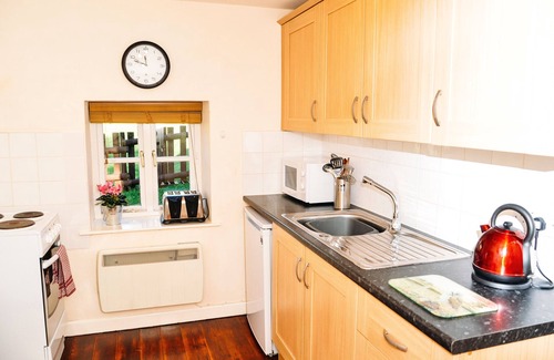 Llanvair Kilgeddin Cottage | A canalside cottage, within Goytre Wharf on the Monmouthshire & Brecon Canal