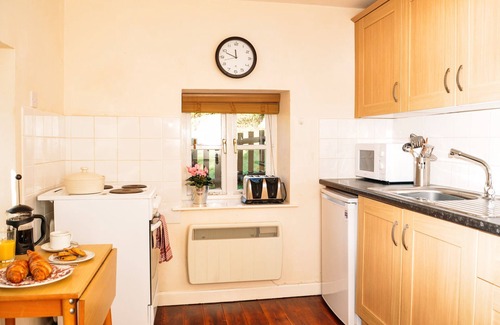 Llanvair Kilgeddin Cottage | A canalside cottage, within Goytre Wharf on the Monmouthshire & Brecon Canal