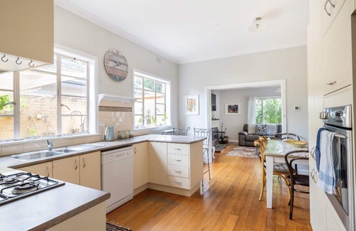 Rosebud Cottage | A charming european cottage close to the beach.