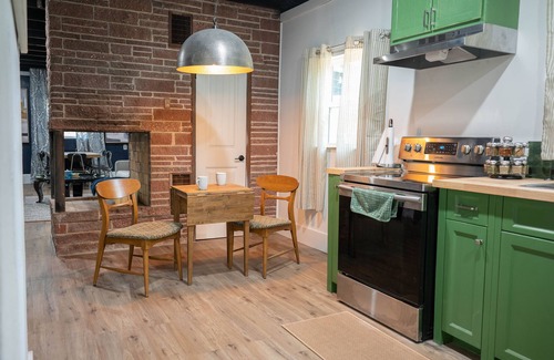 Winnsboro House | A charming quirky retreat nestled amidst the beauty of many majestic trees.
