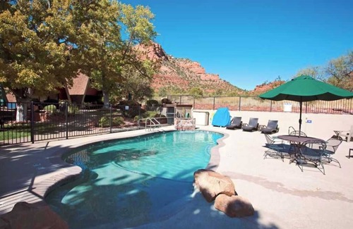 Oak Creek Ski Chalet | A cozy forest-side chalet with beautiful views of Sedona's red rocks.