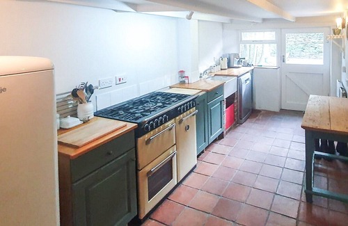 Little Petherick Cottage | A delightful stone cottage with many original features, set within a peaceful Cornish village and cl