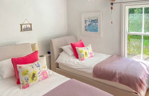 Little Petherick Cottage | A delightful stone cottage with many original features, set within a peaceful Cornish village and cl