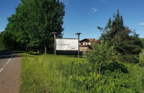 Ironwood Apartment | A fun fishing themed private guestroom for up to 5 inside the Lodge at North Ironwood Acres resort. TWO bathrooms! DOG FRIENDLY!.