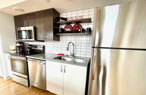 Southeast Omaha Apartment | A historic Husker themed, 1,300 square foot loft in the heart of the Old Market