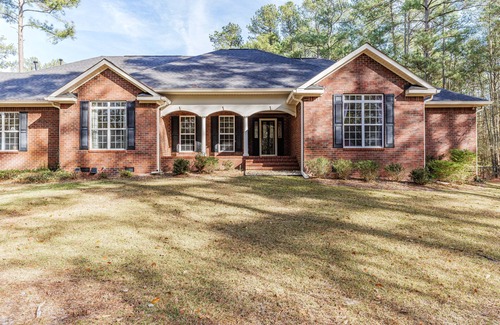 Bath House | A Hole in One Home in North Augusta w/array of amenities: pool, gameroom & more