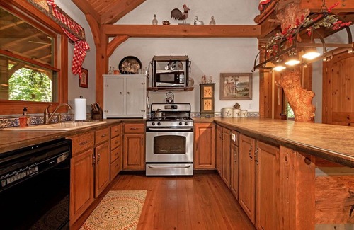 Brevard Cabin | A Laurel Haven, with big porches and a log cabin feel. Fireplace.