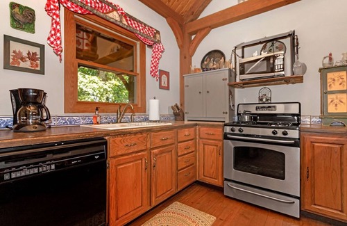 Brevard Cabin | A Laurel Haven, with big porches and a log cabin feel. Fireplace.