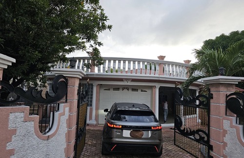 Molynes Gardens House | A Luxurious 2 Bedroom Vacation Home House Safe & Secured with grills remote gate