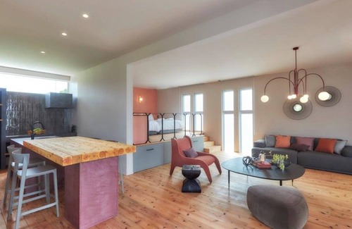 Karimata House | A luxurious inn with a coralcolored interiorEmer / Miyakojima Okinawa