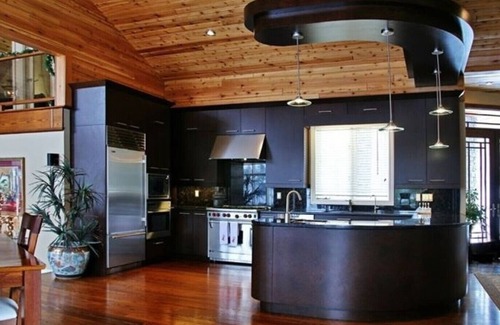 Georgian Bay House | A luxurious villa nestled along the bay upon a rock , breathtaking sunset views