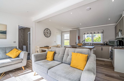 Bridgnorth Ski Chalet | A luxury three-bedroom lodge with a modern lounge layout, perfect for families.