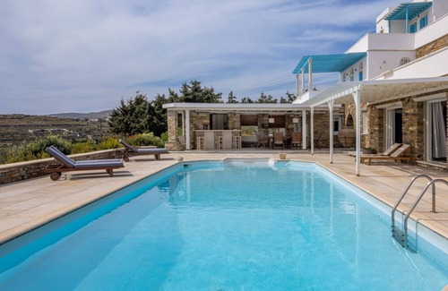 Agios Fokas House | a magnificent villa in a Mediterranean garden, with shared swimming pool