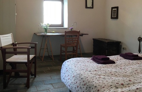 Thalames Villa | A medieval tower house in the Peloponnese with huge garden and amazing sea views