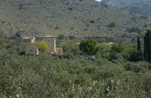 Thalames Villa | A medieval tower house in the Peloponnese with huge garden and amazing sea views