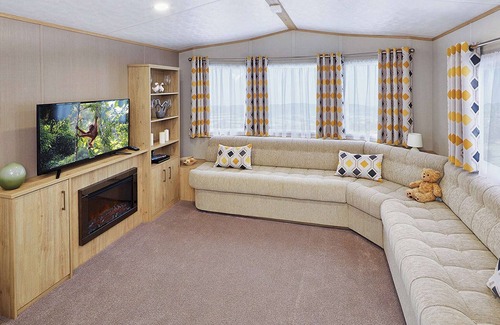 Cresswell House | A modern holiday home with one master double and two twin bedrooms.