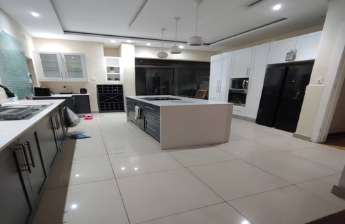 Greater Johannesburg Metropolitan Area House | A Mother a Sons and Daughter Approach Towards Modern Living