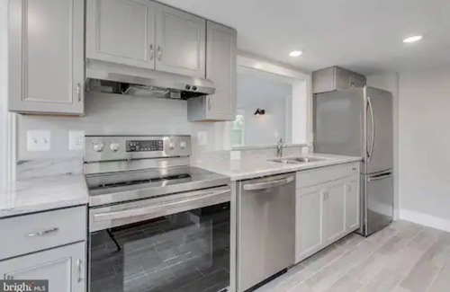 Frederick Condo | A newly renovated, pet-friendly Penthouse condo with private rooftop deck.