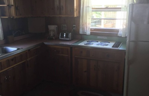 Pentwater Cottage | A peaceful little lakefront house on the sunset side of Bass Lake!