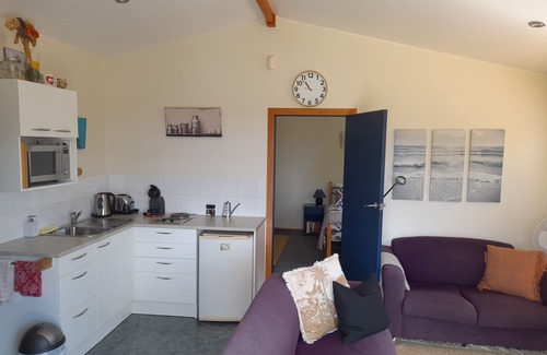 Kaeo Cottage | A peaceful, well appointed, dog friendly bach offering fantastic rural views.