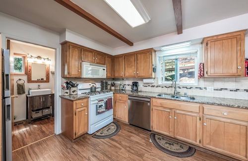 Bass Lake Cabin | A private dock, secluded cove, large deck, lots of parking, amazing lake view.