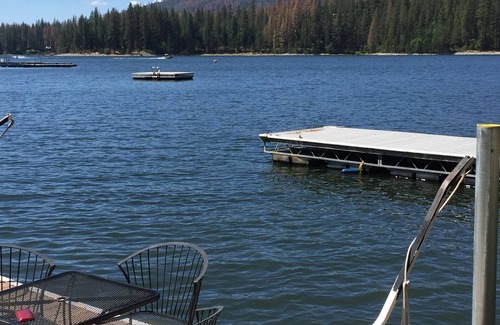 Bass Lake Cabin | A private dock, secluded cove, large deck, lots of parking, amazing lake view.