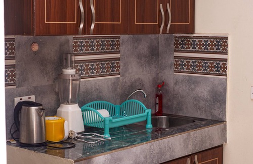 Bukoto Apartment | A quiet one bedroom set with small gym and swimming pool.