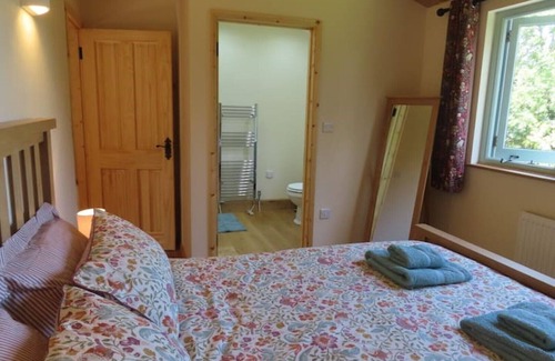 Dulverton Cabin | A secluded log cabin lodge with stunning views.
