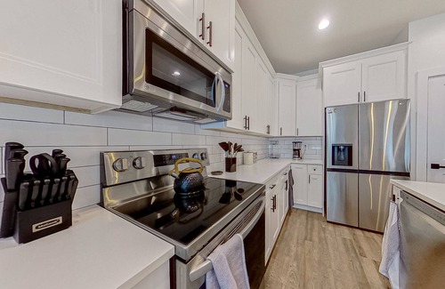 North Port House | A Stone’s Throw | House in North Port with enclosed backyard, grill, streaming
