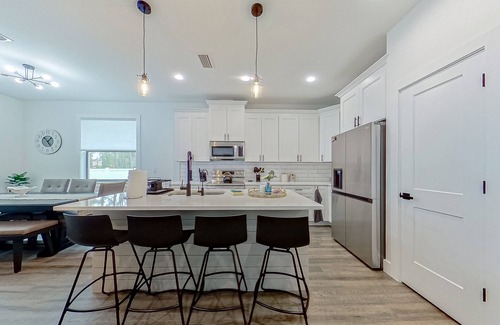 North Port House | A Stone’s Throw | House in North Port with enclosed backyard, grill, streaming