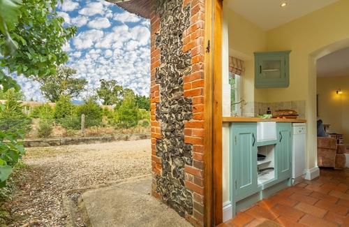 East Tuddenham Apartment | A unique octagonal brick and flint thatched Victorian cottage nestling in a tranquil village locatio