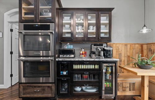 Forest Junction House | A warm & inviting modern retreat featuring on-site local brews & a home theater.