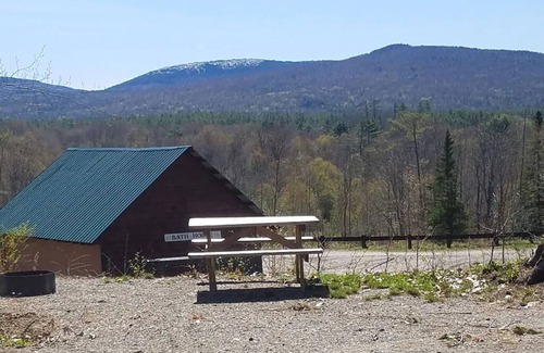 Sunday River Area Apartment | AA Moose Point, picturesque mountain views with a heated pool and quiet river.