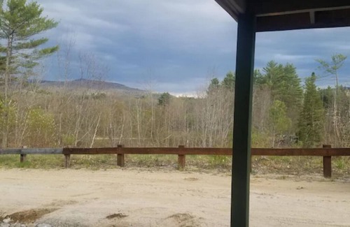 Sunday River Area Apartment | AA Moose Point, picturesque mountain views with a heated pool and quiet river.