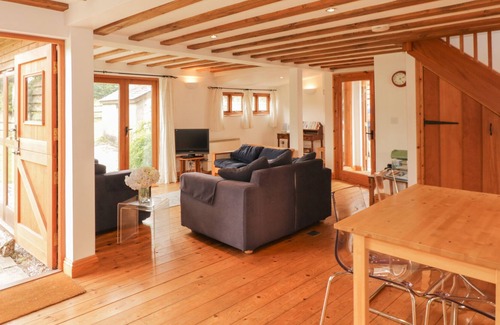 Honiton Cottage | ABBEY CROSS BARN, pet friendly, with a garden in Dunkeswell Abbey