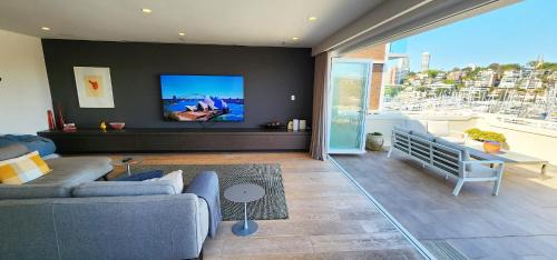 Elizabeth Bay Apartment | Absolute Waterfront with Oversized Private Terrace