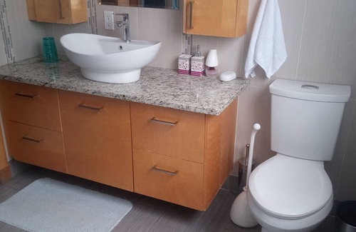Laval Apartment | Accommodation with whirlpool bath and light shower