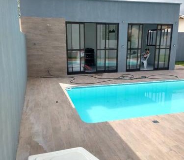 Campo d'Aviacao House | Aconchegante casa de Madeira com linda área lazer!