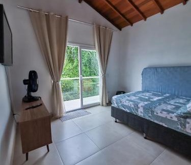 Tesouro da Colina Ski Chalet | Aconchego em Ilhabela