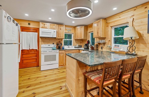 Moultonborough Cottage | Adirondack inspired cottage with access to association beach on Lake Winni