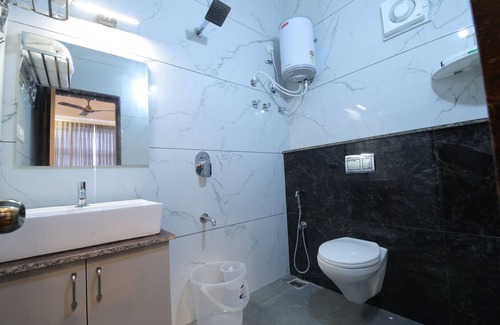 Mysore Hotel | ADITHI COMFORTS INN AND SUITES