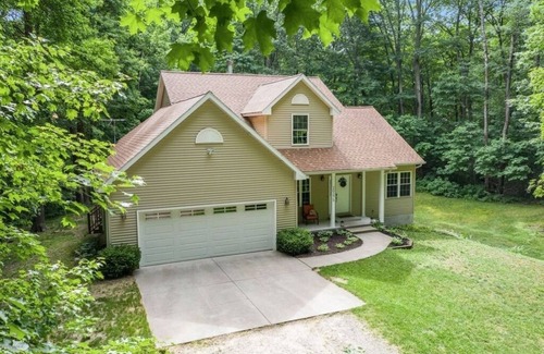 South Haven House | Adjacent to Van Buren State Park. Huge backyard with hot tub and fire pit.