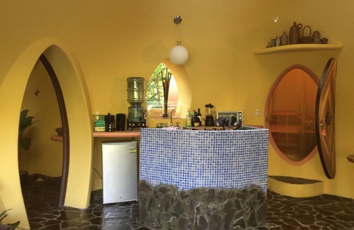 Puerto Viejo de Talamanca House | Adobe-style Dome Home with a pool In A Lush garden minutes from the beach.